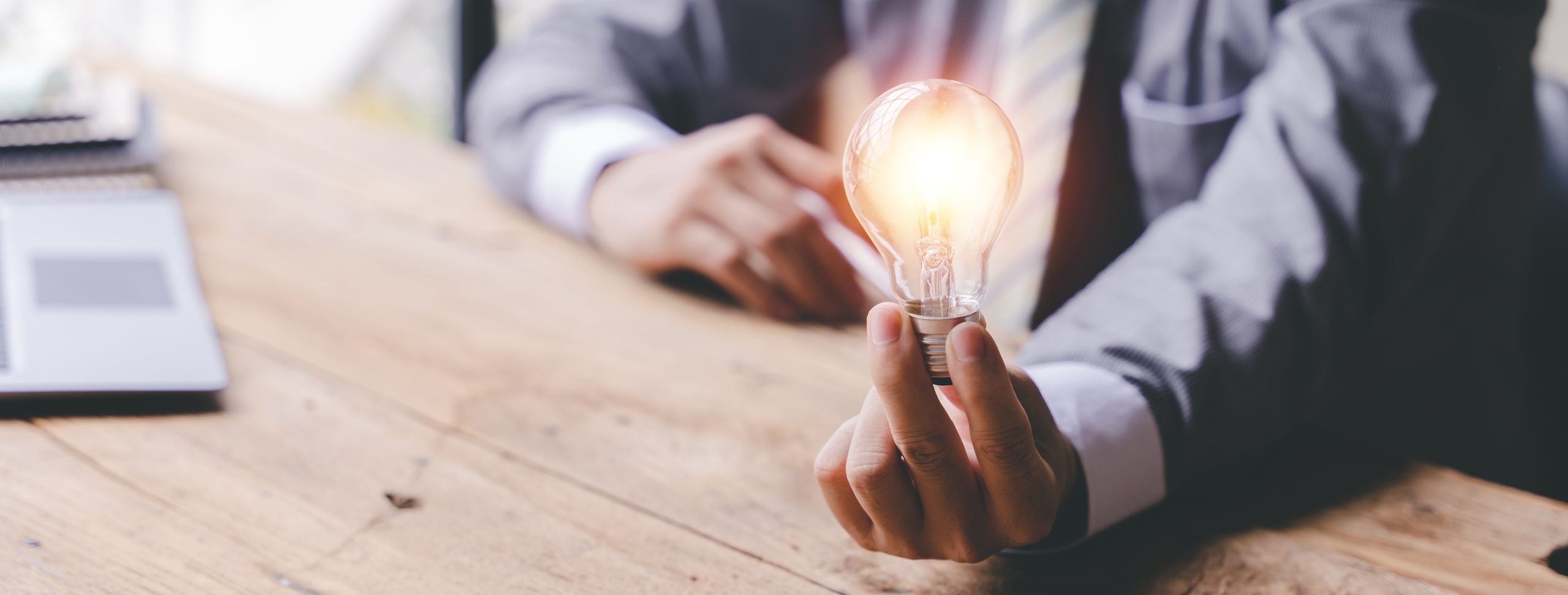 Think of the idea of holding a light bulb. Innovative ideas that are inspirational and energy efficient.